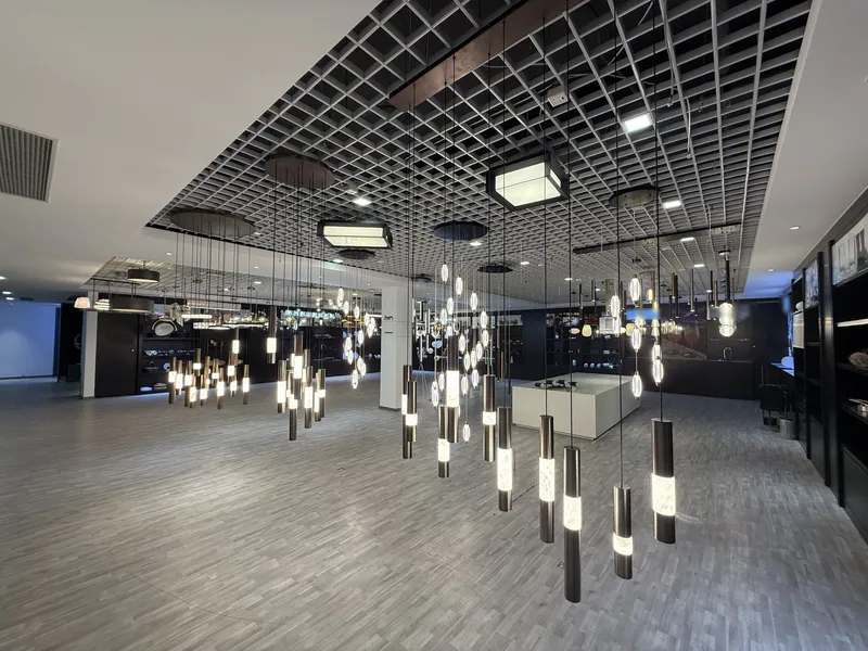 Pendant lights lit in the CORONA ZHONGSHAN LIGHTING showroom in Henglan, Zhongshan